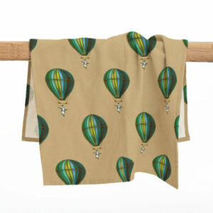 Muted Blue Penguin in Flight Tea Towel